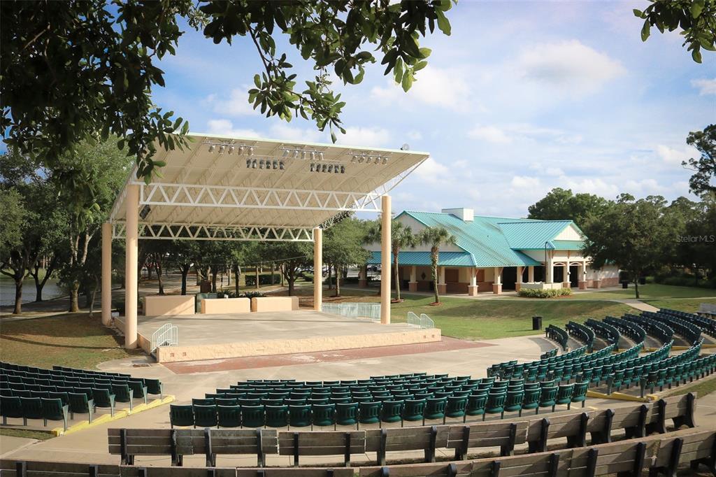 55 Crooked Pine Road Port Orange, FL 32128 - Photo 25 of 28 a front view of a building with a garden