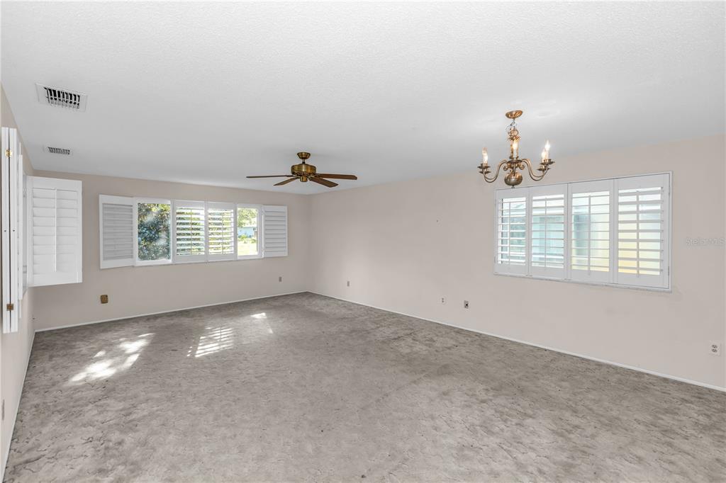 55 Crooked Pine Road Port Orange, FL 32128 - Photo 10 of 28 an empty room with windows