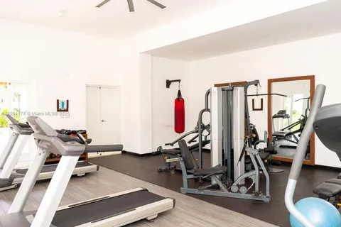 a view of a room with gym equipment