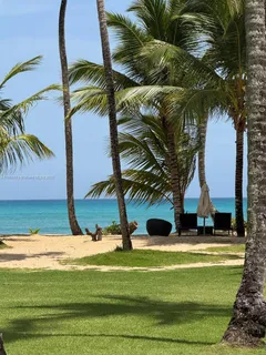 a view of swimming pool with a yard