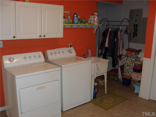 2030 Pilot-Riley Road Zebulon, NC 27597 - Photo 19 of 25 a utility room with dryer and washer