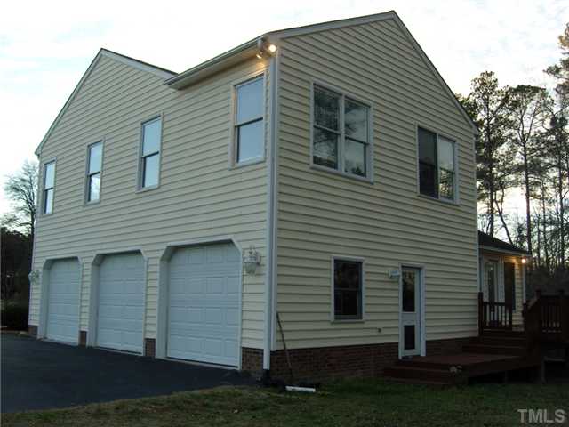 2030 Pilot-Riley Road Zebulon, NC 27597 - Photo 2 of 25 a front view of a house with a yard