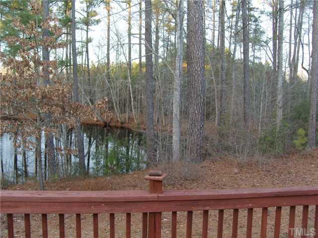 2030 Pilot-Riley Road Zebulon, NC 27597 - Photo 21 of 25 a view of a yard with a tree in it