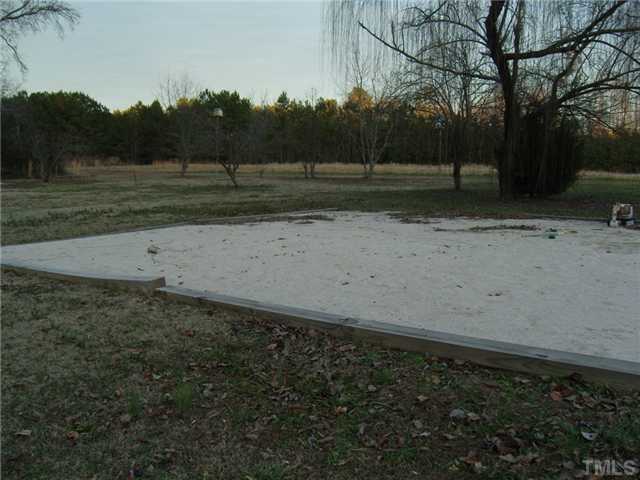 2030 Pilot-Riley Road Zebulon, NC 27597 - Photo 24 of 25 a view of outdoor space with green field