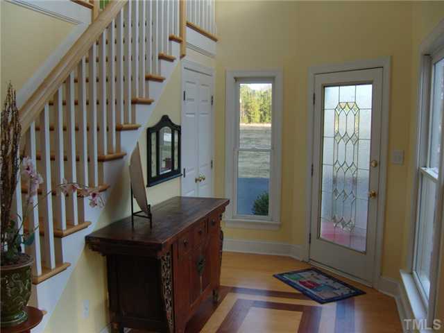 2030 Pilot-Riley Road Zebulon, NC 27597 - Photo 3 of 25 a view of an entryway with wooden floor