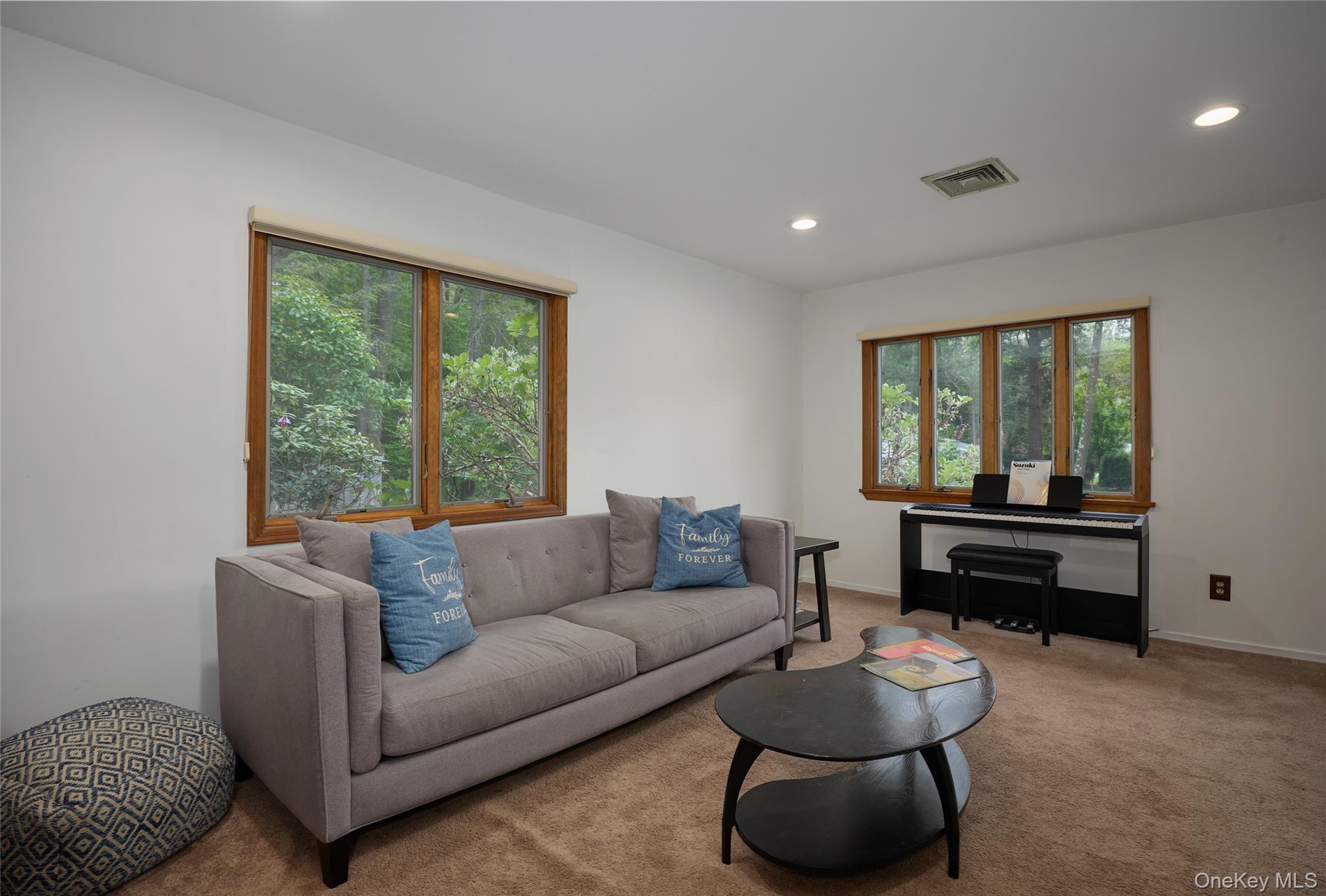 34 Maple Brook Road Tuxedo Park, NY 10987 - Photo 19 of 25 a living room with furniture and a large window