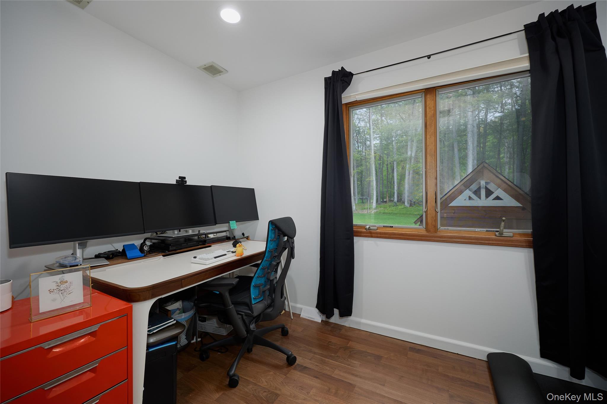 34 Maple Brook Road Tuxedo Park, NY 10987 - Photo 10 of 25 a view of a workspace with furniture and a window