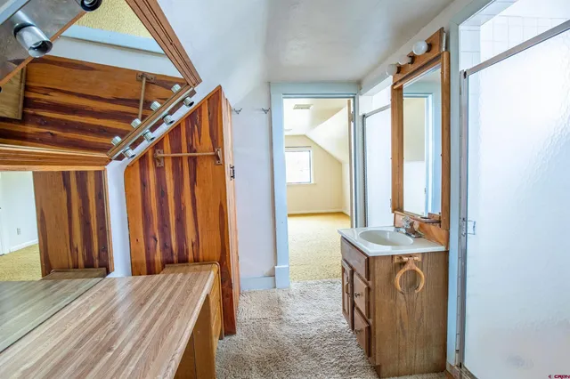 a view of hallway with washer and dryer