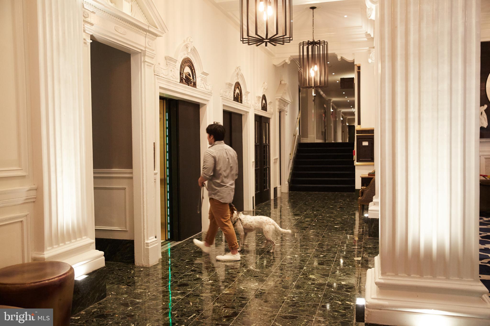 1520-28 Spruce Street, Unit 202 Philadelphia, PA 19102 - Photo 14 of 24 a view of entryway and hall with wooden floor