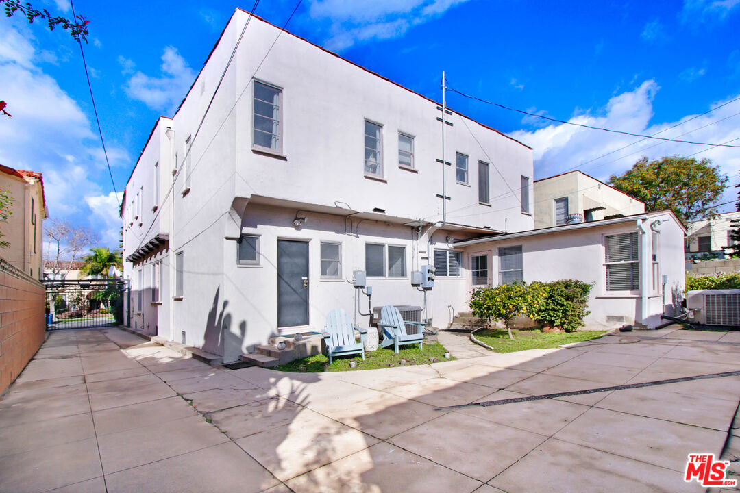 1020 Hi Point Street, Unit 1020 Los Angeles, CA 90035 - Photo 16 of 37 a view of a building with a street