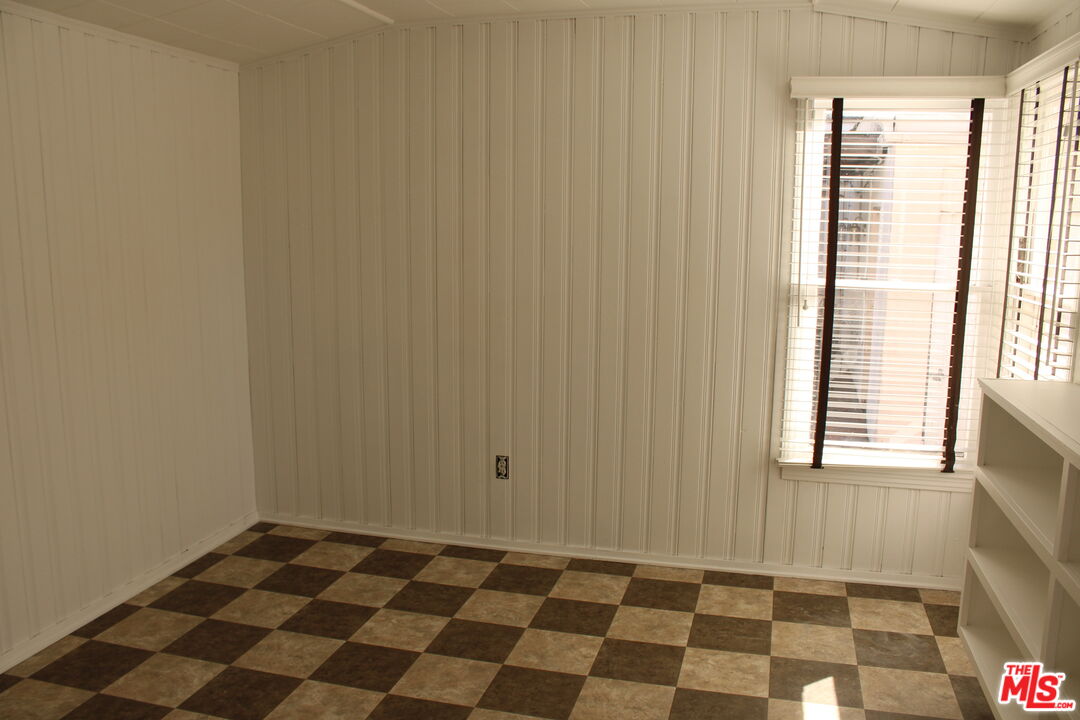 1020 Hi Point Street, Unit 1020 Los Angeles, CA 90035 - Photo 29 of 37 a view of a black and white checkered floor with a black white checkered floor