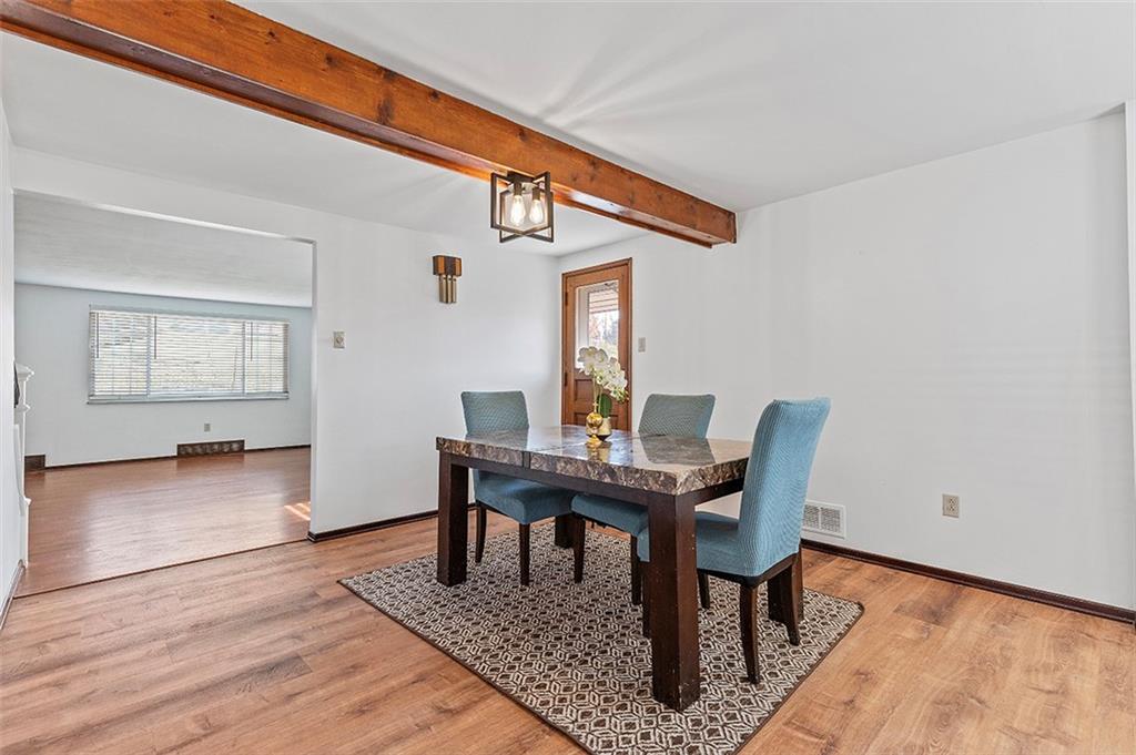 5018 Grove Road Pittsburgh, PA 15234 - Photo 14 of 41 a workspace with furniture and wooden floor