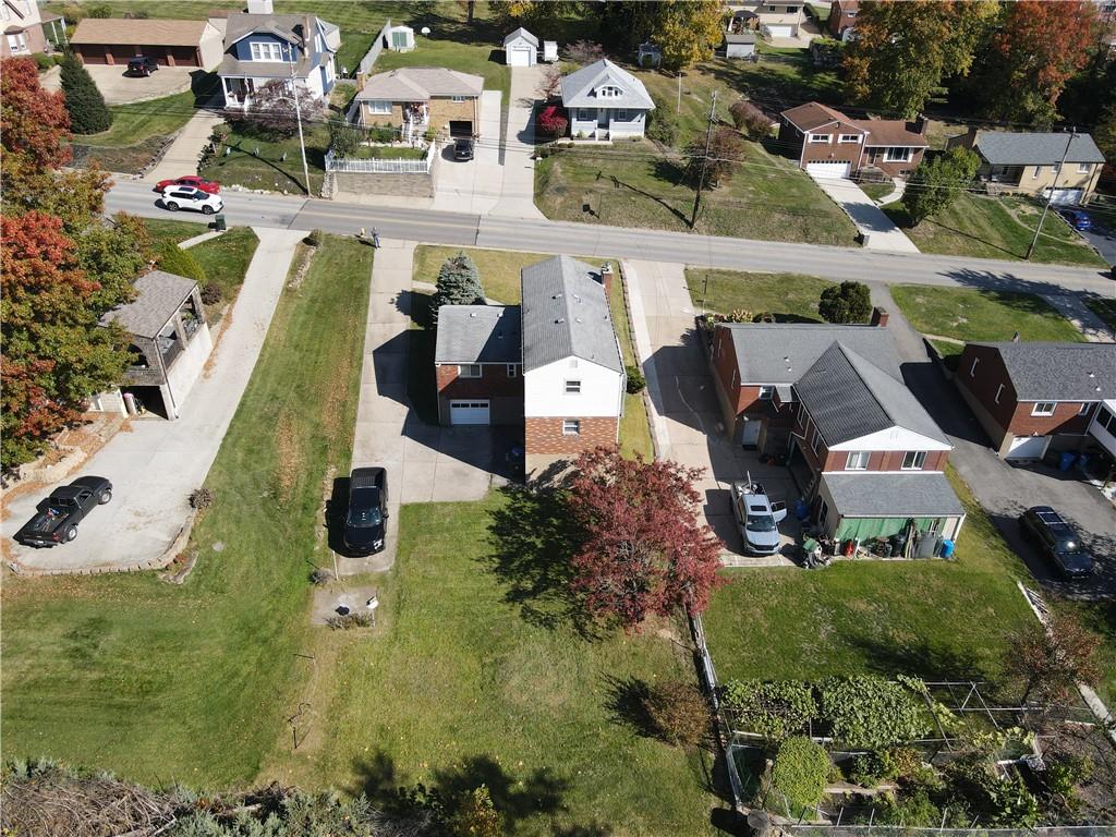 5018 Grove Road Pittsburgh, PA 15234 - Photo 36 of 41 an aerial view of residential houses with outdoor space