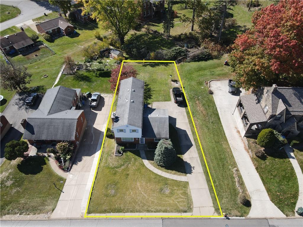 5018 Grove Road Pittsburgh, PA 15234 - Photo 4 of 41 an aerial view of a house with swimming pool