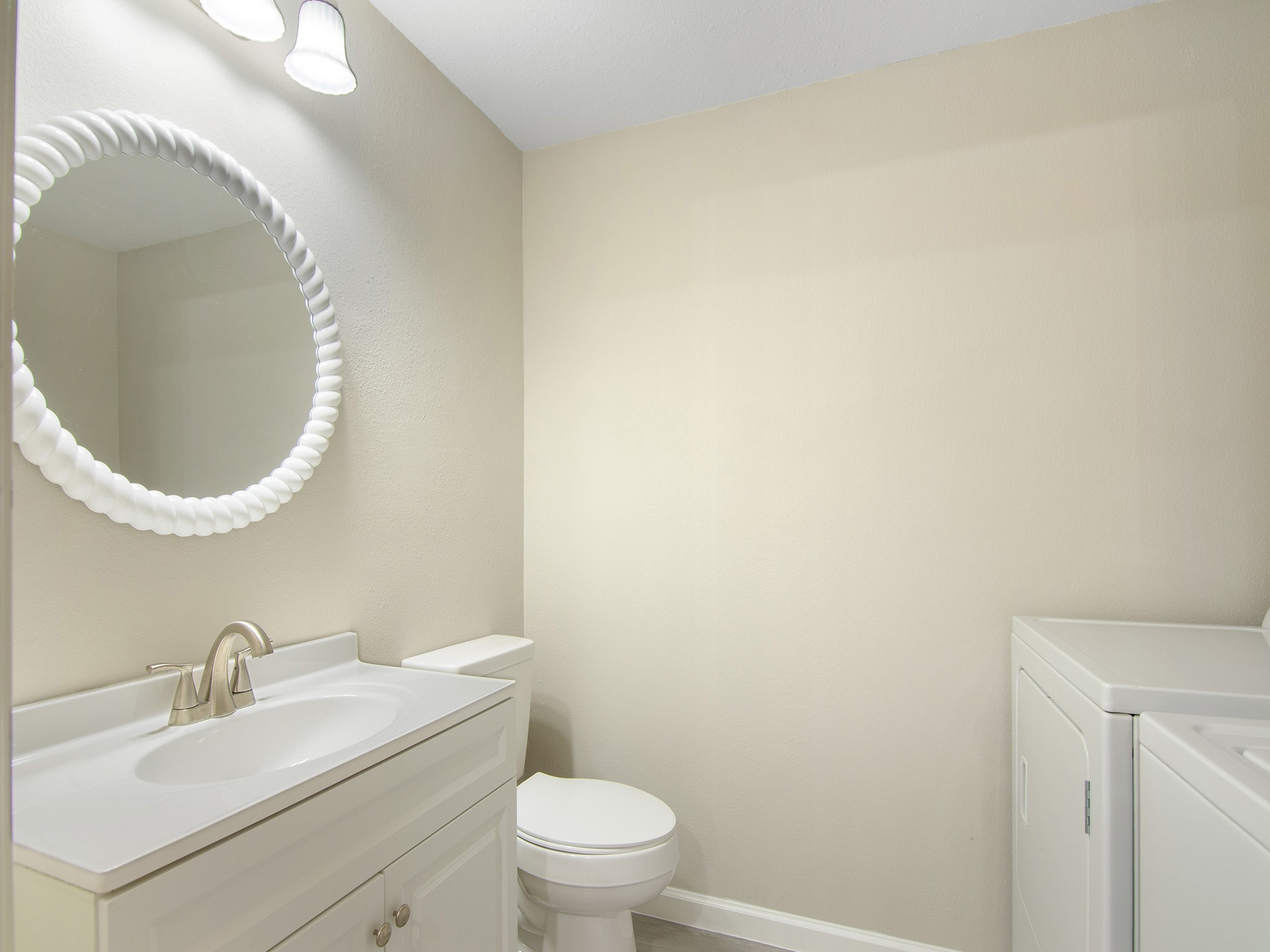 11624 Village Pl Drive, Unit 327 Houston, TX 77077 - Photo 13 of 24 a bathroom with a sink and a mirror
