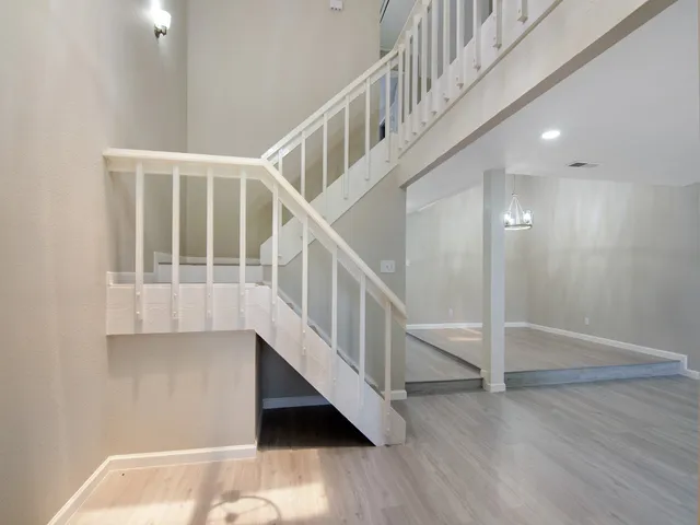 a view of entryway with wooden floor