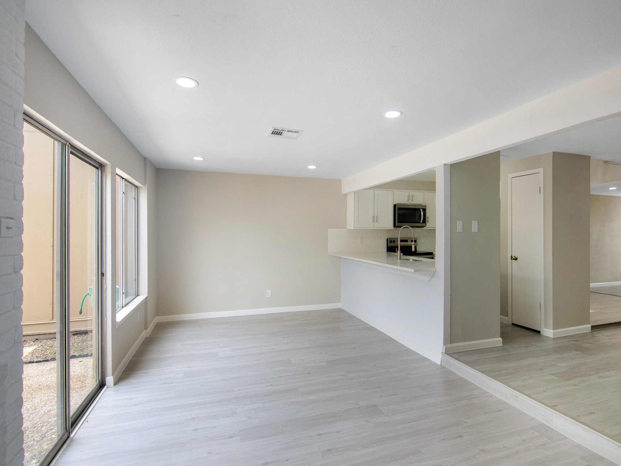 11624 Village Pl Drive, Unit 327 Houston, TX 77077 - Photo 9 of 24 a view of kitchen with refrigerator and window