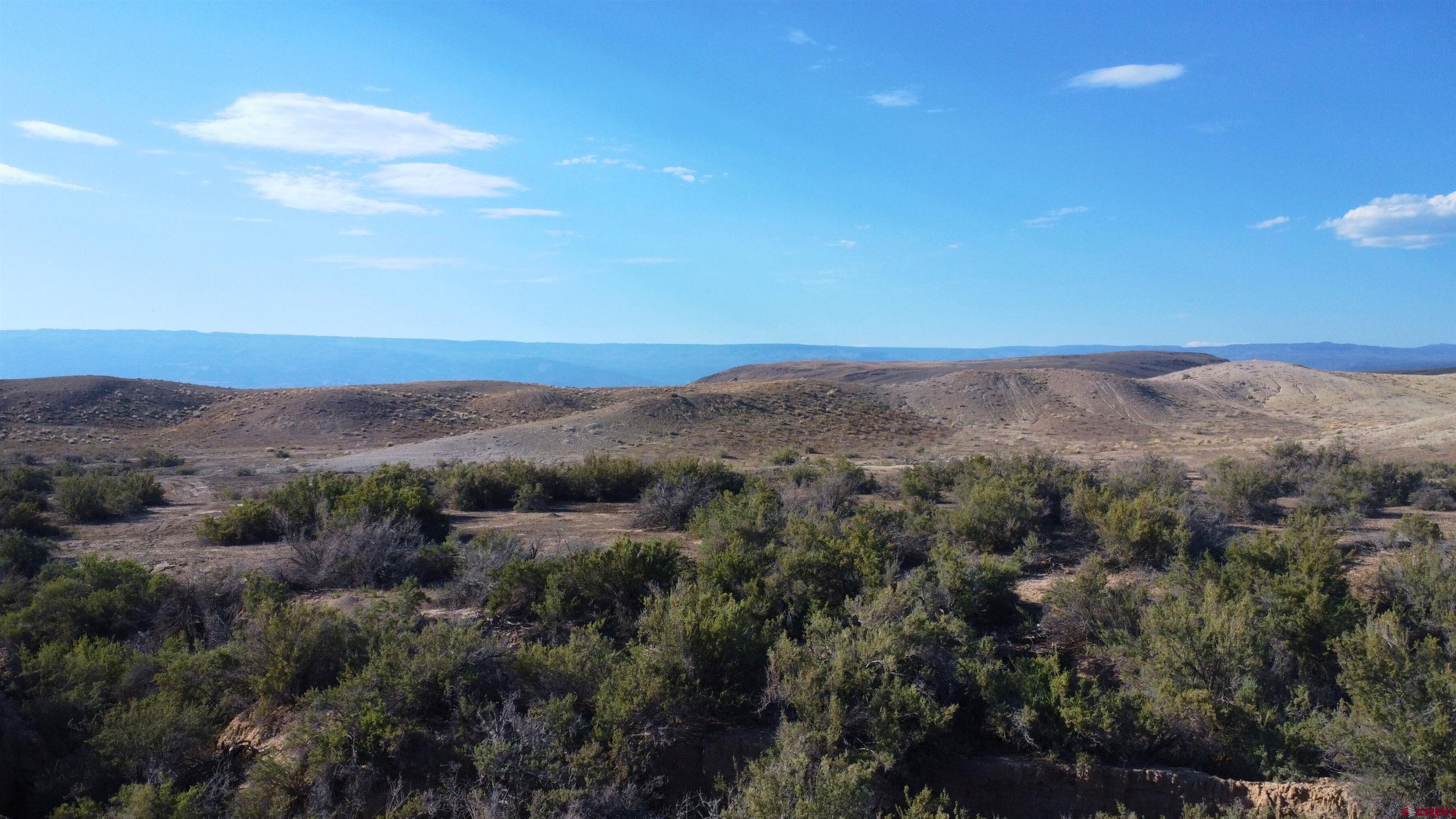 5 H75 Road Delta, CO 81416 - Photo 14 of 29 an aerial view of mountain and trees
