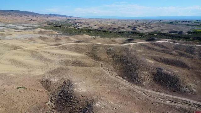 a view of a lake with mountains in the background