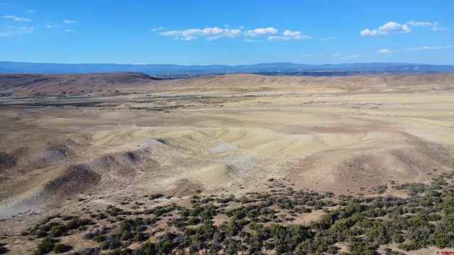 a view of beach and an ocean