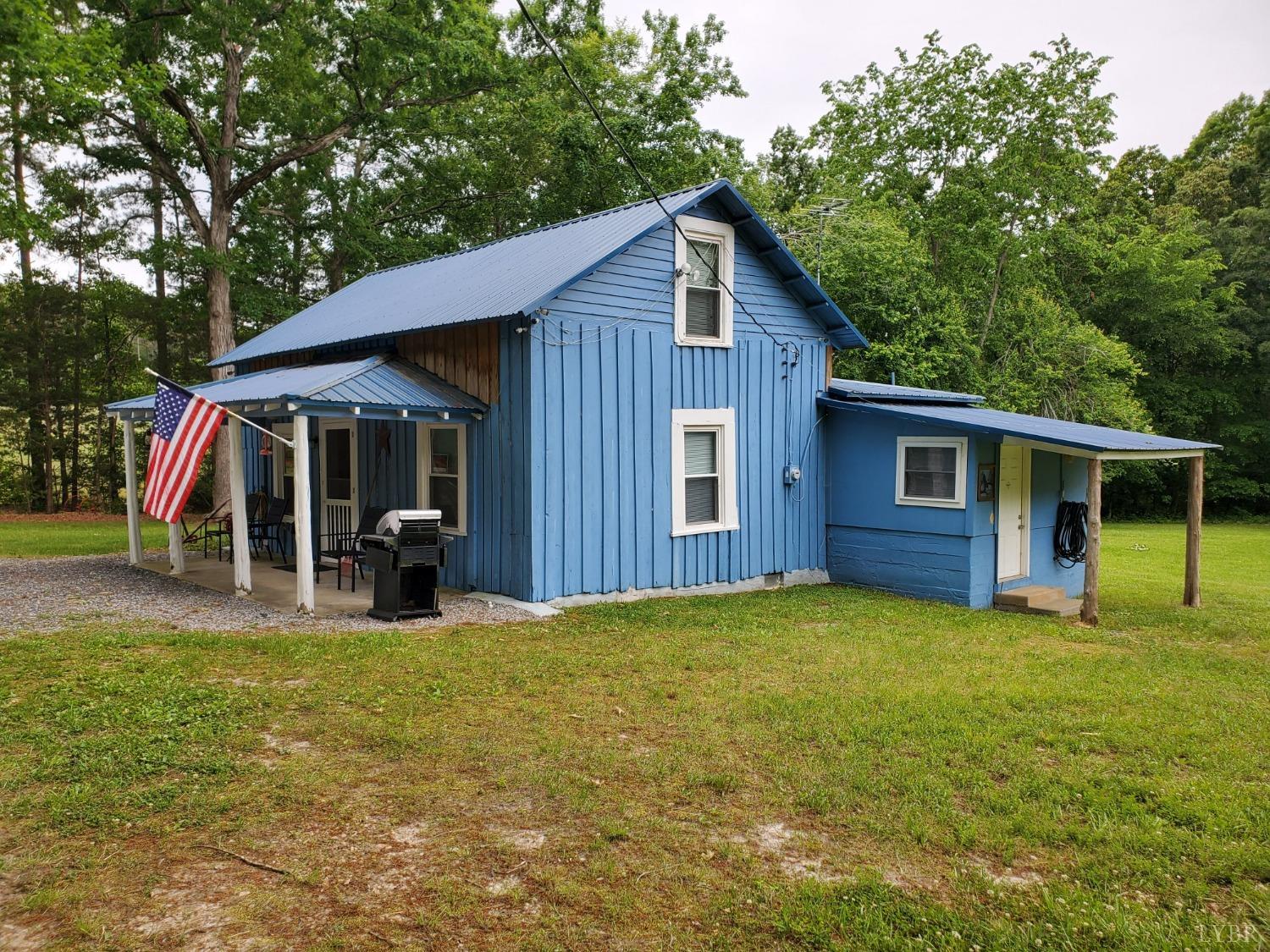 2237 Wards Corner Road Keysville, VA 23947 - Photo 3 of 20 a view of a house with a yard and sitting area