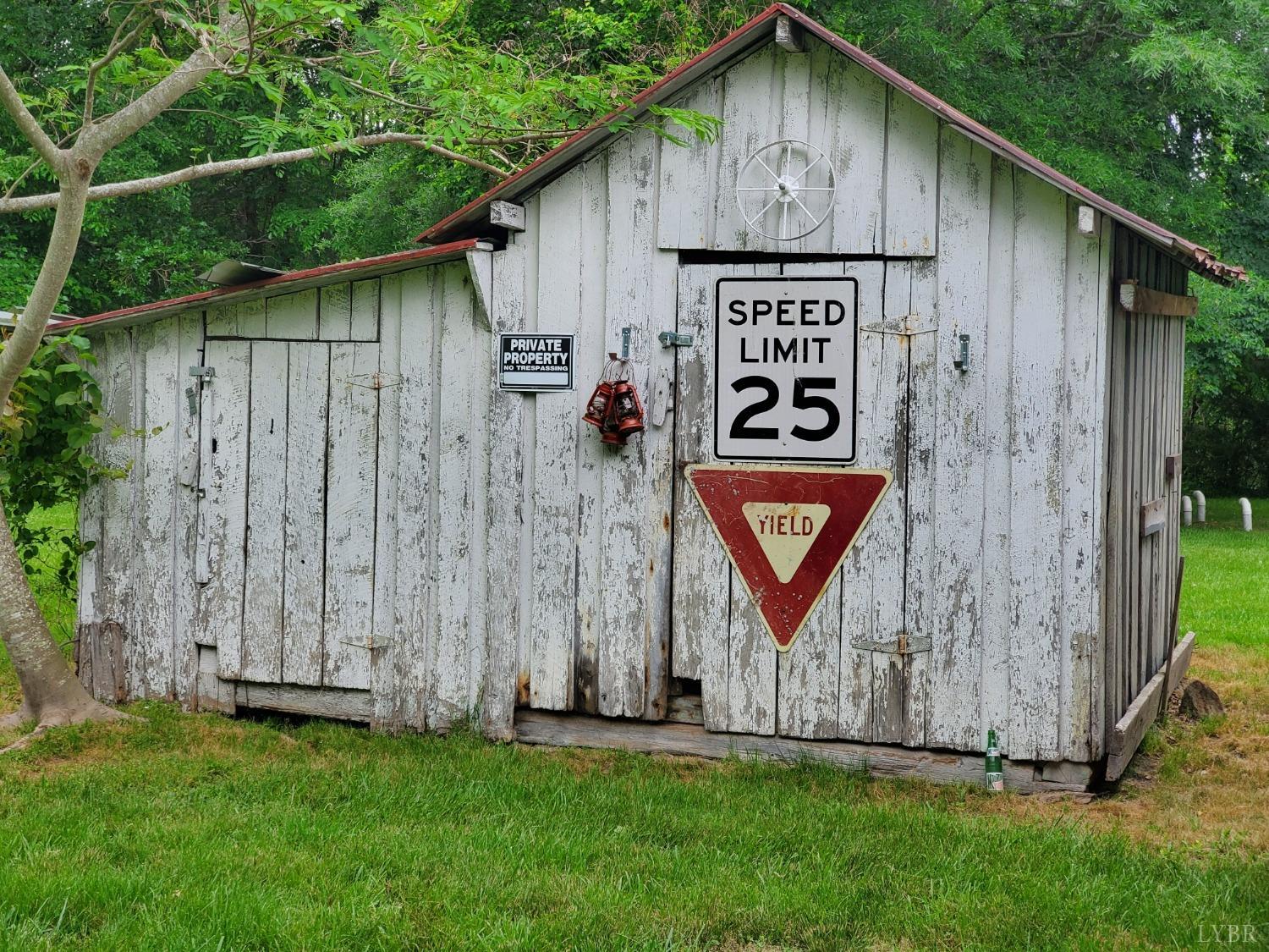 2237 Wards Corner Road Keysville, VA 23947 - Photo 5 of 20 a sign on the side of a house