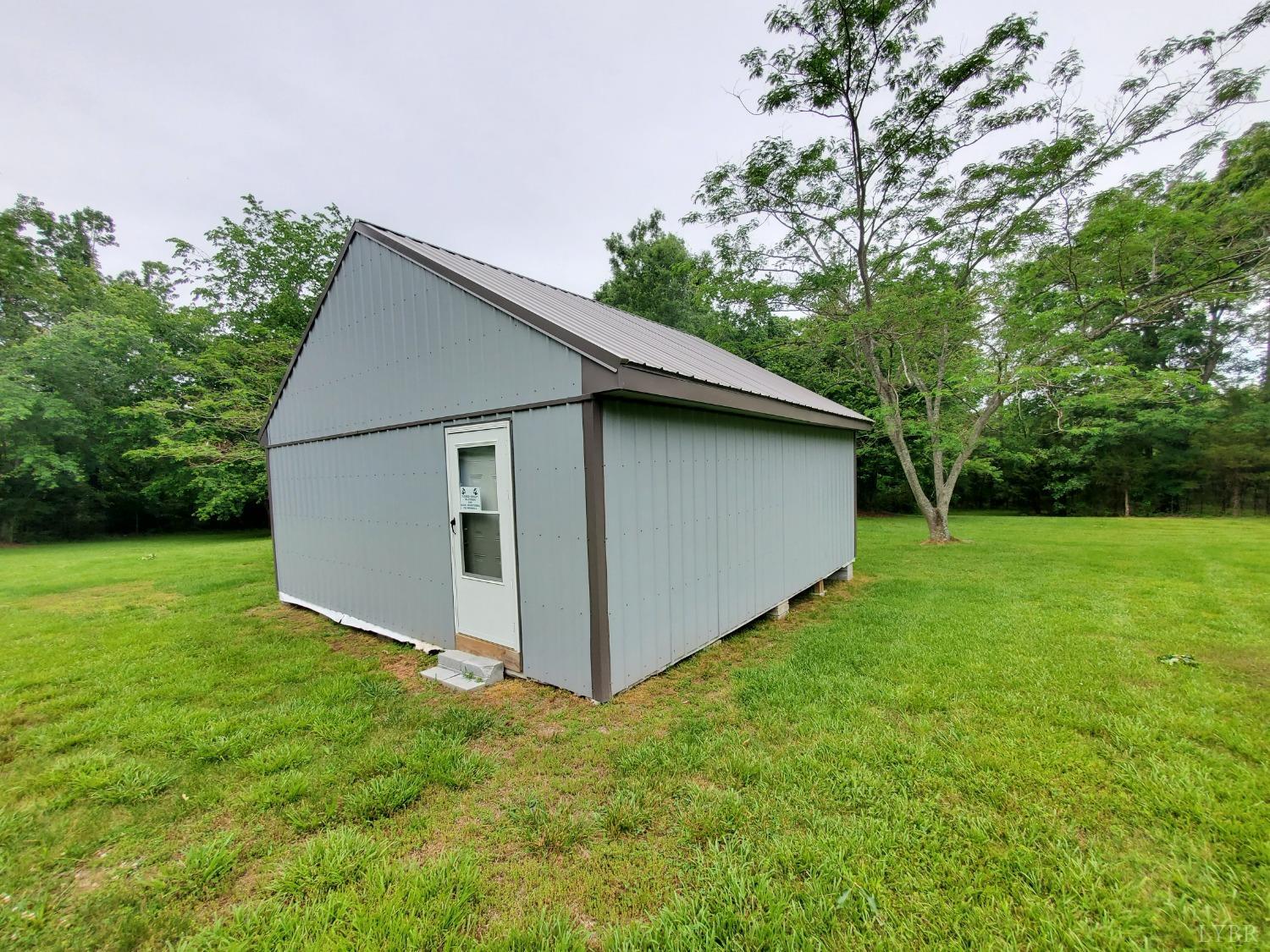 2237 Wards Corner Road Keysville, VA 23947 - Photo 6 of 20 a view of backyard of house with green space