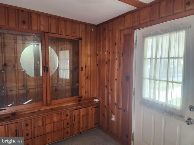 a view of a room with racks on the wall