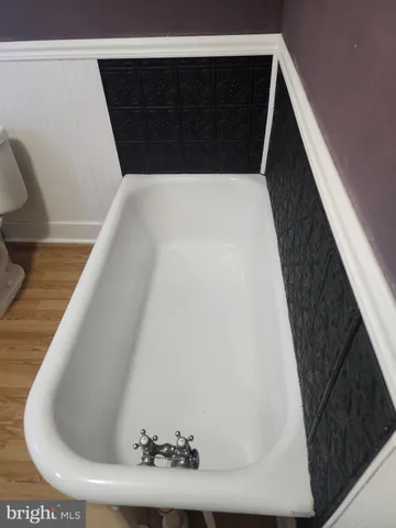 a view of a small space with racks on the wall