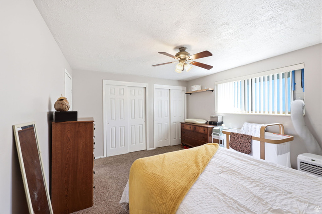 314 West Center Street, Unit F102 Bountiful, UT 84010 - Photo 18 of 29 Room featuring neutral wall tones and textured carpet