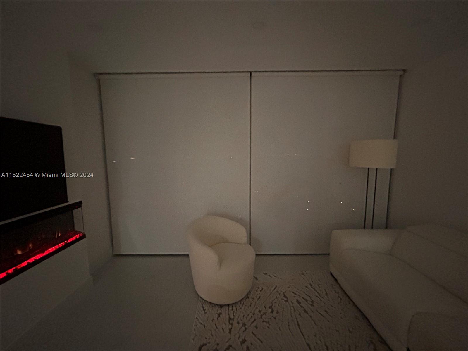 7601 East Treasure Drive, Unit PH206 North Bay Village, FL 33141 - Photo 22 of 24 a utility room with dryer and washer