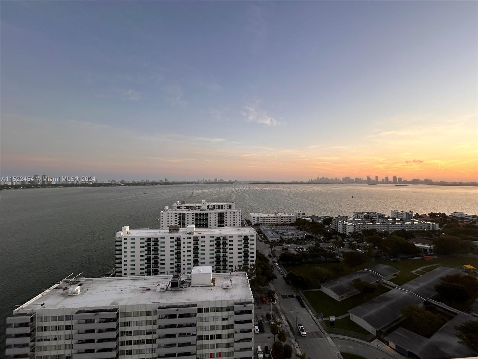 7601 East Treasure Drive, Unit PH206 North Bay Village, FL 33141 - Photo 4 of 24 a view of a terrace with a lake view