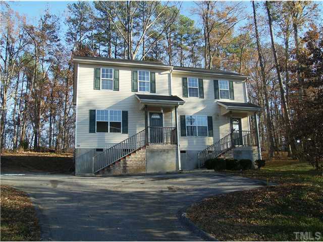 1601 Rose Raleigh, NC 27610 - Photo 1 of 3 a front view of a house with a yard