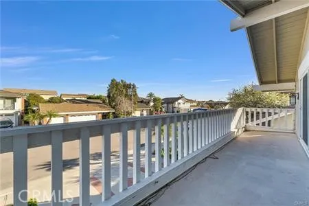 a view of a balcony with an ocean view