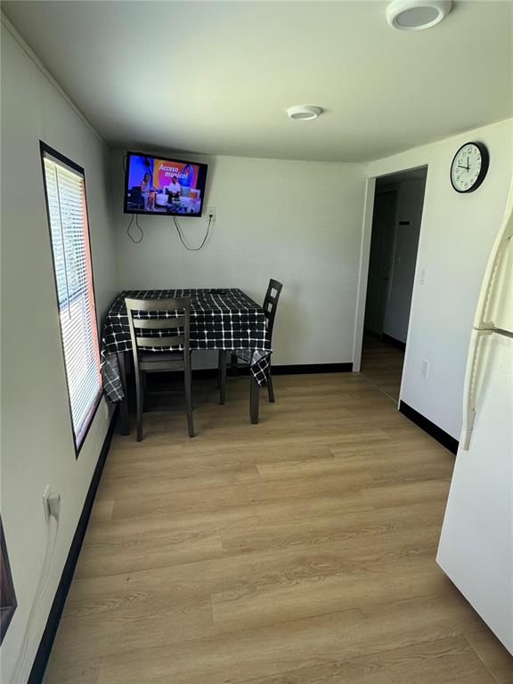 15482 Mapletree Drive Punta Gorda, FL 33955 - Photo 11 of 12 a room with furniture and a flat screen tv