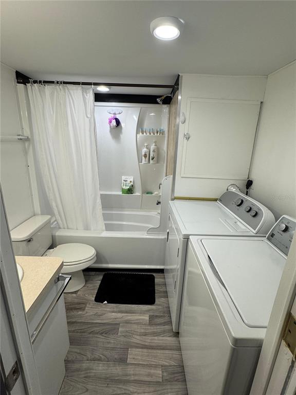 15482 Mapletree Drive Punta Gorda, FL 33955 - Photo 4 of 12 a utility room with dryer and washer