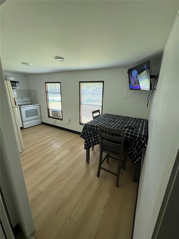 15482 Mapletree Drive Punta Gorda, FL 33955 - Photo 9 of 12 a room with furniture and a window