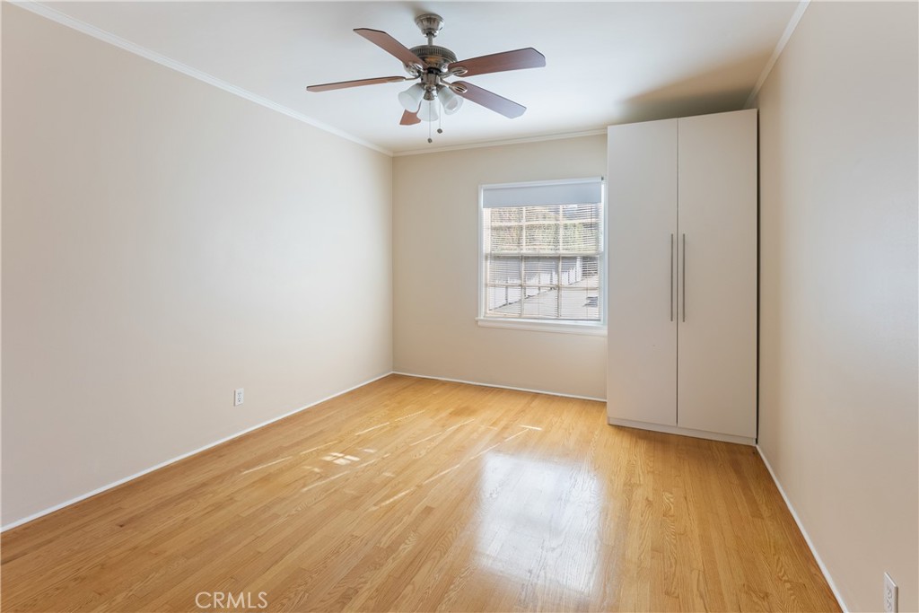 15207-15203 Greenleaf Street Sherman Oaks, CA 91403 - Photo 26 of 32 wooden floor in an empty room with a window