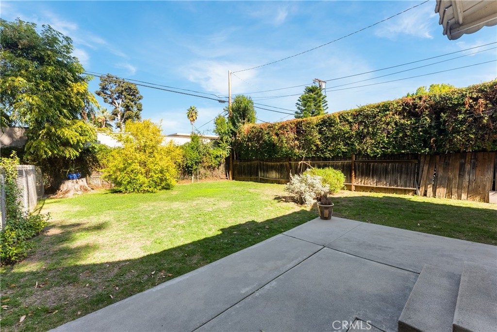 15207-15203 Greenleaf Street Sherman Oaks, CA 91403 - Photo 30 of 32 a view of a garden with sitting area