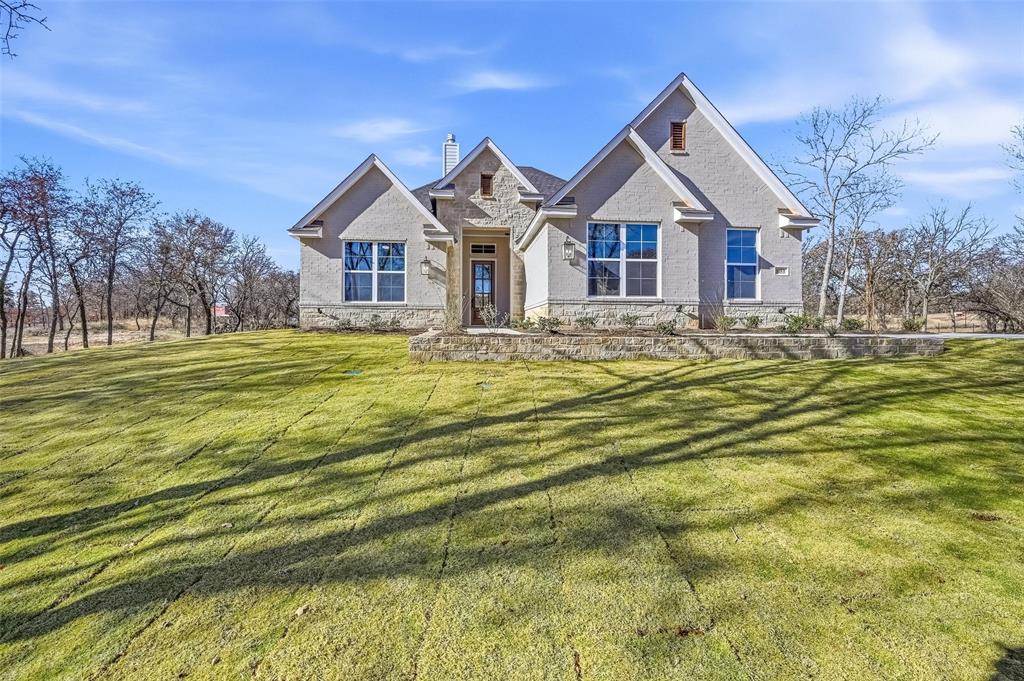 a view of a house with a big yard