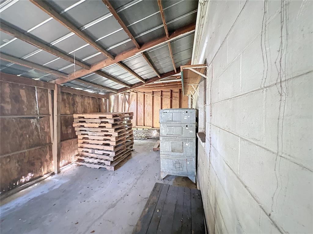 110 Reynolds Road Deleon Springs, FL 32130 - Photo 11 of 27 a view of storage and utility room