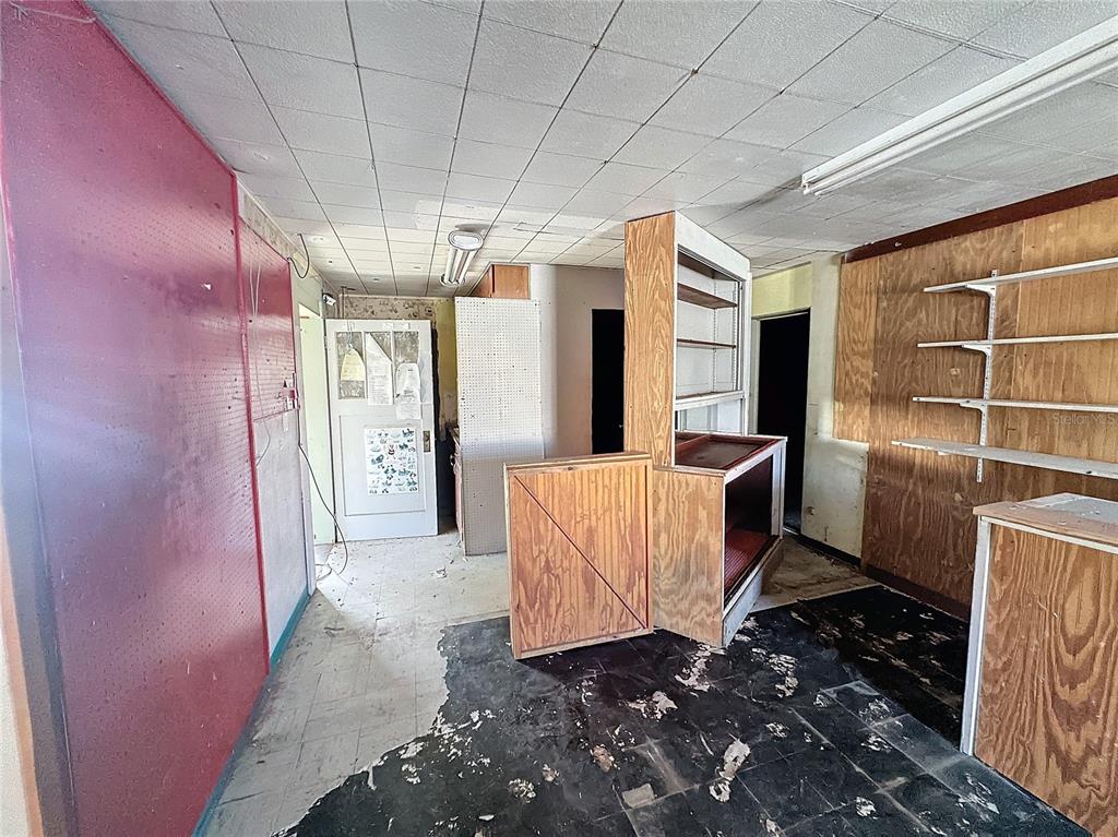 110 Reynolds Road Deleon Springs, FL 32130 - Photo 6 of 27 a view of an empty room with a window
