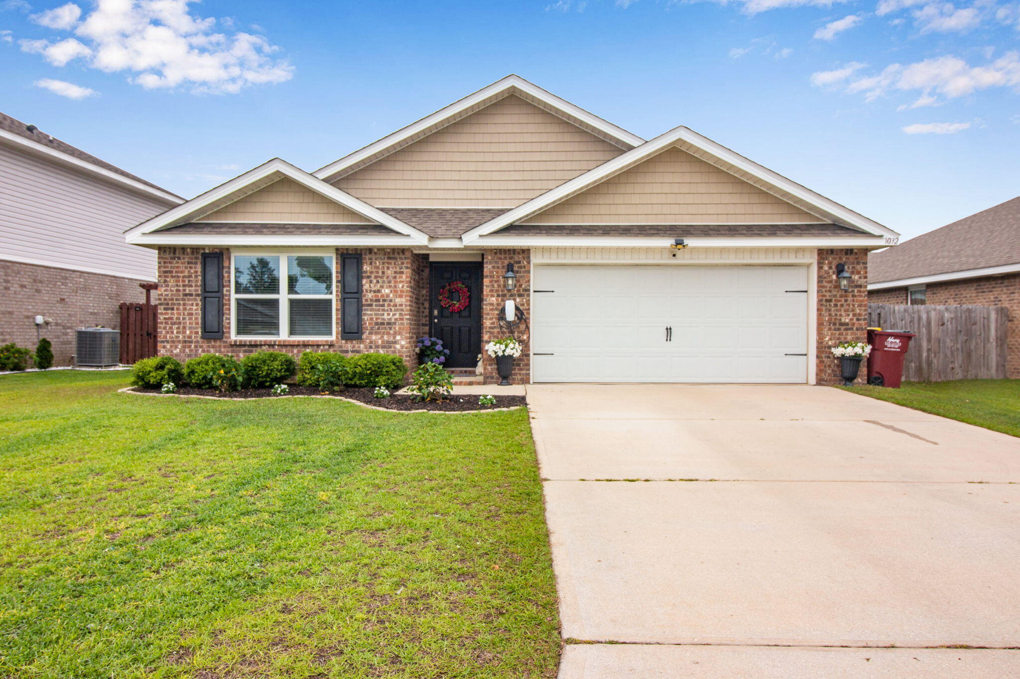 1032 Limpkin Street Crestview, FL 32539 - Photo 1 of 29 a view of a house with garden