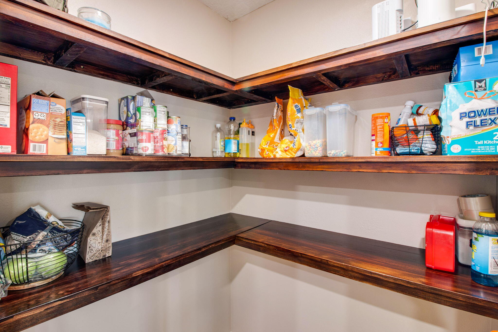 1032 Limpkin Street Crestview, FL 32539 - Photo 13 of 29 a view of storage and utility room with wooden floor
