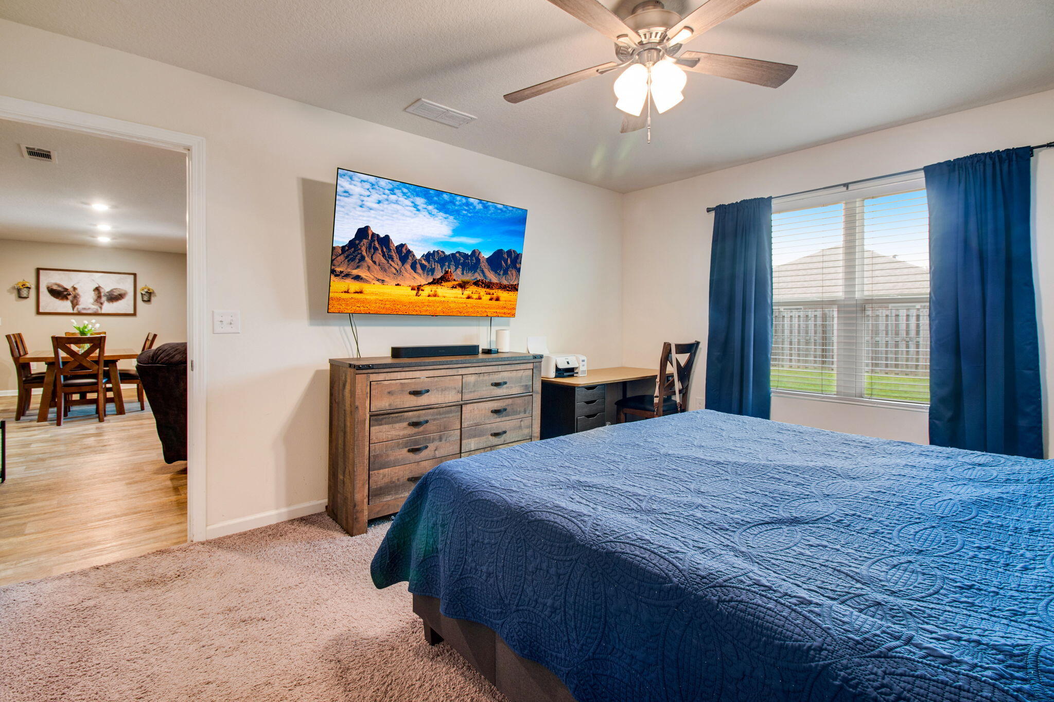 1032 Limpkin Street Crestview, FL 32539 - Photo 15 of 29 a bedroom with a bed and a flat screen tv