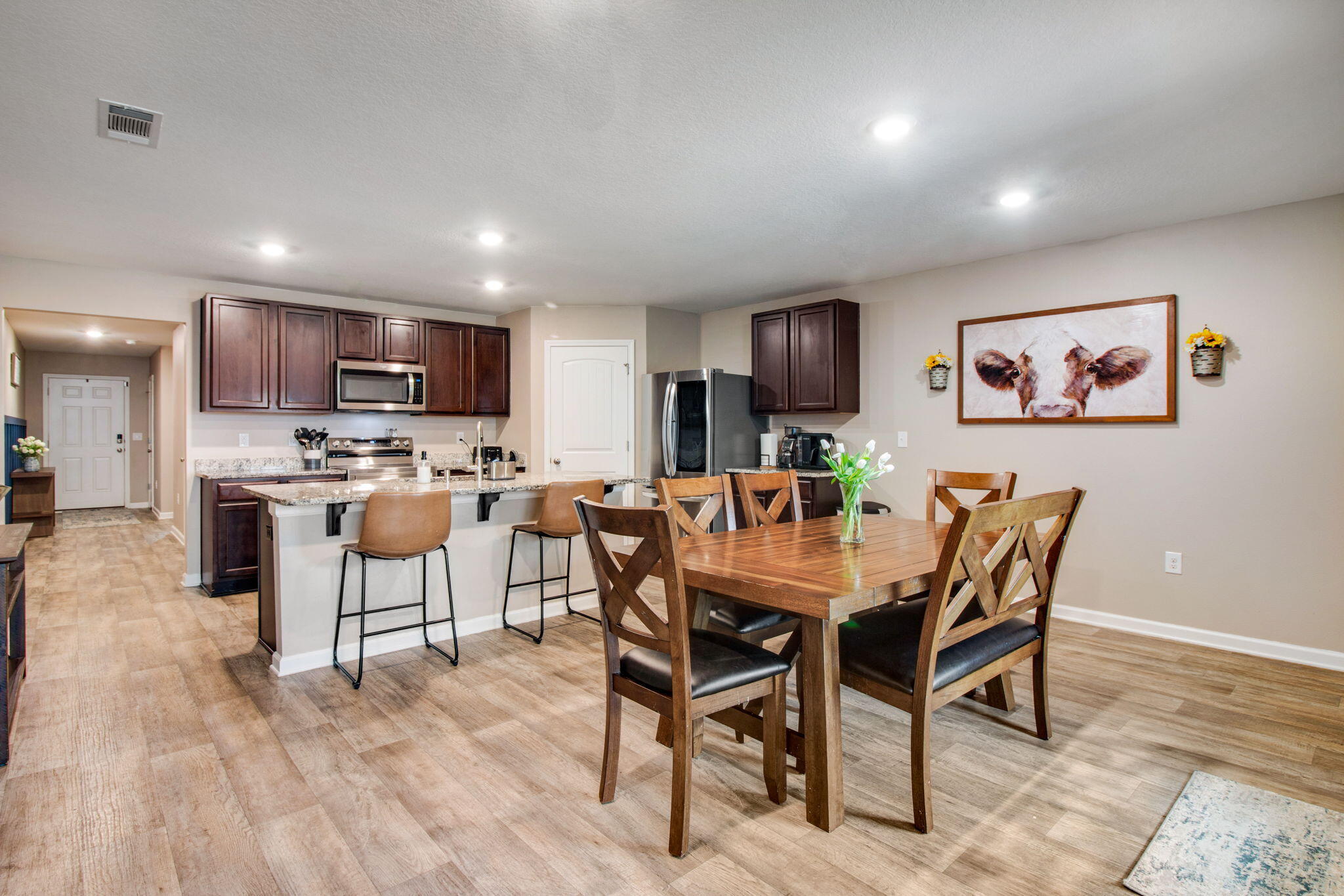 1032 Limpkin Street Crestview, FL 32539 - Photo 8 of 29 a view of a dining room with furniture