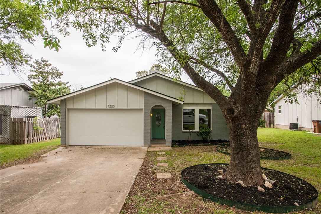 3220 Oak Alley Austin, TX 78745 - Photo 1 of 1 a view of a house with a yard