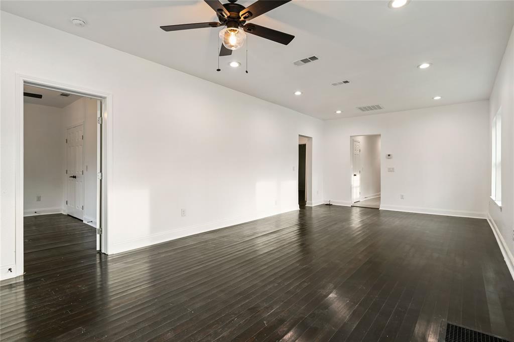 1106 West Chestnut Street Denison, TX 75020 - Photo 25 of 29 a view of an empty room with wooden floor