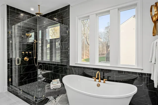 a kitchen with granite countertop wooden cabinets stainless steel appliances and a granite counter tops