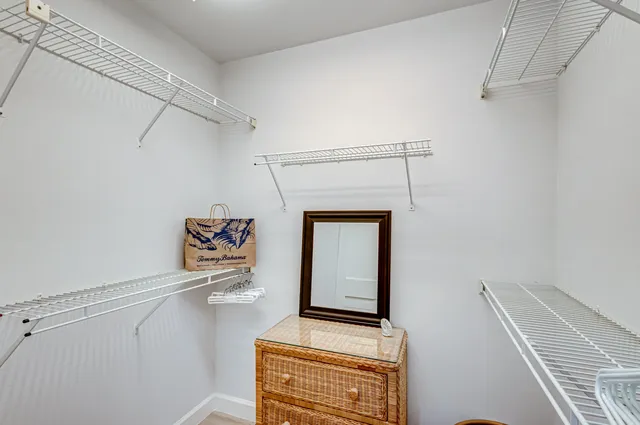 a kitchen with stainless steel appliances a refrigerator and cabinets